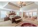 Expansive main bedroom featuring a trey ceiling, sitting area, and luxurious finishes at 3202 Lucky Pl, Conyers, GA 30013