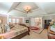 Expansive main bedroom with fireplace, sitting area, and luxurious finishes at 3202 Lucky Pl, Conyers, GA 30013
