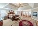 Expansive main bedroom featuring a trey ceiling, fireplace and luxurious finishes at 3202 Lucky Pl, Conyers, GA 30013