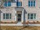 Beautful brick home with an inviting entrance and well-manicured landscaping at 1979 Deco Dr, Kennesaw, GA 30144