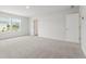 Bright bedroom with a neutral color palette and plush carpeting at 2529 Brown Dove Way (Lot 80), Grayson, GA 30017