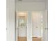 Hallway with access to a bathroom and carpeted room at 2529 Brown Dove Way (Lot 80), Grayson, GA 30017