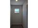 Hallway with a window and wall to wall carpeting at 2539 Brown Dove Way(Lot 81), Grayson, GA 30017