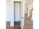 Hallway with a closet and hardwood flooring at 2539 Brown Dove Way(Lot 81), Grayson, GA 30017
