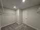 Walk-in closet with carpet and wire shelving for efficient storage at 2539 Brown Dove Way(Lot 81), Grayson, GA 30017