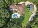 Stunning aerial view of a large house with a private backyard, pool, patio, and ample parking space at 3355 Old Peachtree Rd, Dacula, GA 30019