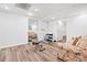Spacious basement featuring wood-look flooring, recessed lighting, and exercise equipment at 3355 Old Peachtree Rd, Dacula, GA 30019