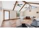 Bedroom with high vaulted ceiling, wood beams, and large windows at 3355 Old Peachtree Rd, Dacula, GA 30019