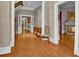 Elegant foyer boasting gleaming hardwood floors, neutral walls, and classic architectural details at 561 Culberson Sw St, Atlanta, GA 30310