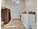 Laundry room with washer, dryer, and storage at 561 Culberson Sw St, Atlanta, GA 30310