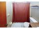 Bathroom includes a toilet and shower at 2202 Springdale Dr, Snellville, GA 30078