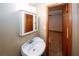 Bathroom features a sink and vanity with a view into an adjoining bedroom at 2202 Springdale Dr, Snellville, GA 30078