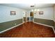 Traditional dining room features a chandelier, wood floors, and neutral tones at 2202 Springdale Dr, Snellville, GA 30078