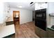 Bright kitchen area featuring modern stainless steel microwave and oven and a sleek tile backsplash at 2202 Springdale Dr, Snellville, GA 30078