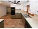 A modern kitchen featuring stylish cabinets, sleek countertops, stainless steel sink, and updated appliances at 2202 Springdale Dr, Snellville, GA 30078