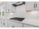 Modern kitchen features stainless steel appliances, subway tile backsplash, and quartz countertops at 722 Crossroad Ct, Powder Springs, GA 30127