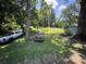 Expansive backyard with mature trees, providing a private and peaceful setting at 1482 Whitfield Se St, Smyrna, GA 30080