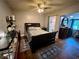 Comfortable bedroom with hardwood floors, a closet, and bright, natural light at 1482 Whitfield Se St, Smyrna, GA 30080