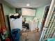 Functional laundry room with washer, dryer, and extra storage, designed for convenience at 1482 Whitfield Se St, Smyrna, GA 30080