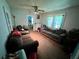 Comfortable living room with couches, ceiling fan and plenty of natural light at 1482 Whitfield Se St, Smyrna, GA 30080