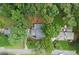 Aerial view of property showcasing the home and surrounding green landscape at 1655 Oak Crest Ct, Marietta, GA 30066