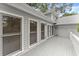 Back deck of a house overlooking a green, wooded backyard at 1655 Oak Crest Ct, Marietta, GA 30066