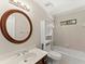 Bathroom with a wooden-framed mirror, white cabinets, and a shower/tub combination at 1655 Oak Crest Ct, Marietta, GA 30066