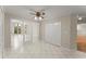 Open dining area with tiled floors, french doors, and access to living space at 1655 Oak Crest Ct, Marietta, GA 30066