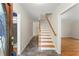 Bright entry foyer featuring tiled flooring and a staircase to the upper level of the home at 1655 Oak Crest Ct, Marietta, GA 30066