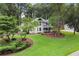 Charming home with a well-maintained front yard and inviting curb appeal at 1655 Oak Crest Ct, Marietta, GA 30066
