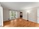 Bright living room featuring hardwood floors, natural light, and an open layout at 1655 Oak Crest Ct, Marietta, GA 30066