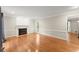 Spacious living room featuring hardwood floors and a cozy fireplace at 1655 Oak Crest Ct, Marietta, GA 30066