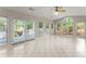 Bright sunroom with large windows offering views of the outdoor area at 1655 Oak Crest Ct, Marietta, GA 30066