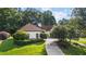Beautifully landscaped front yard with mature landscaping at 2050 Trotters Ridge Way, Roswell, GA 30075