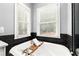 Close-up of a relaxing soaking tub with faucet in a modern bathroom with ample natural light at 1065 Beacon Hill Xing, Alpharetta, GA 30005