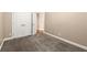 Bedroom features a double door closet, and soft carpet, providing a functional and comfortable space at 1065 Beacon Hill Xing, Alpharetta, GA 30005