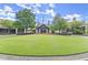 Clubhouse and expansive lawns at The Golf Club of Georgia at 1065 Beacon Hill Xing, Alpharetta, GA 30005