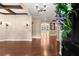 Elegant entryway with hardwood floors and decorative lighting, leading to spacious living areas at 1065 Beacon Hill Xing, Alpharetta, GA 30005