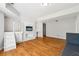 Bonus room including built-in cabinets and desk, with hardwood floors at 2444 Mossy Branch Dr, Snellville, GA 30078