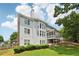 Spacious home with a well-manicured lawn and a covered back porch, perfect for outdoor entertaining at 2444 Mossy Branch Dr, Snellville, GA 30078