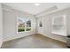 Unfinished garage featuring windows allowing natural light at 2444 Mossy Branch Dr, Snellville, GA 30078