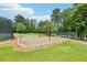 Community playground with swings and nearby lake access provides recreational opportunities at 2444 Mossy Branch Dr, Snellville, GA 30078