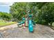 Community playground with slides and climbing structures for to have fun at 2444 Mossy Branch Dr, Snellville, GA 30078