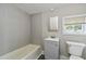 Bathroom with updated tub, and vanity at 971 Sims Nw Ave, Atlanta, GA 30318