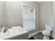 Bathroom with updated fixtures and toilet at 971 Sims Nw Ave, Atlanta, GA 30318