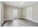 Bedroom with natural light and hardwood floors at 971 Sims Nw Ave, Atlanta, GA 30318