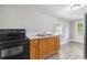 Bright kitchen features essential appliances, light-colored countertop, and convenient storage at 971 Sims Nw Ave, Atlanta, GA 30318