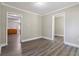 Cozy living room features modern flooring and neutral wall paint at 971 Sims Nw Ave, Atlanta, GA 30318