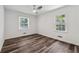 Cozy bedroom featuring wood floors and dual pane windows at 1978 Ethel Ln, Decatur, GA 30032