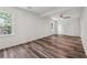 Bright bedroom with wood floors, white walls, ceiling fan and dual pane windows at 1978 Ethel Ln, Decatur, GA 30032